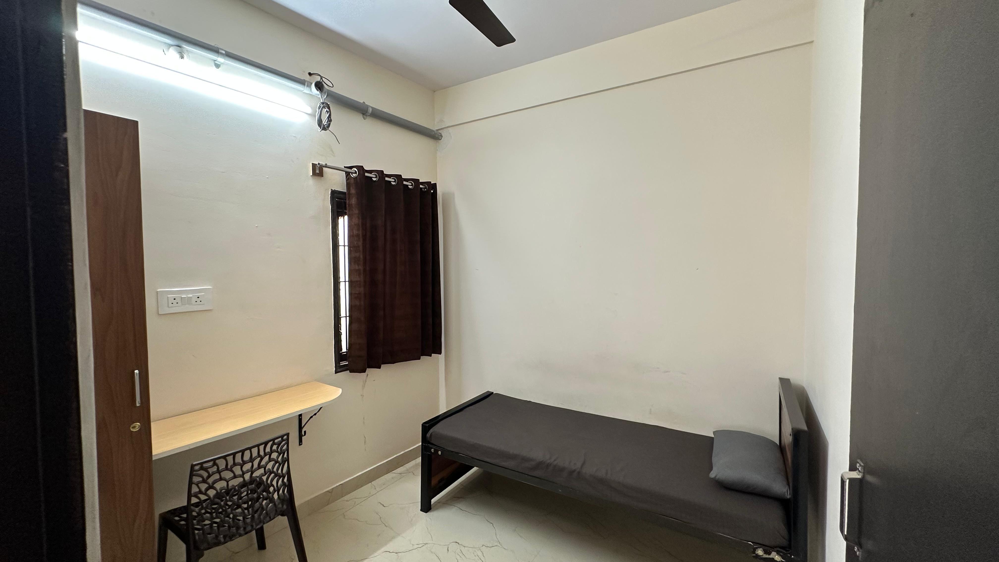 Premium Single Sharing Room